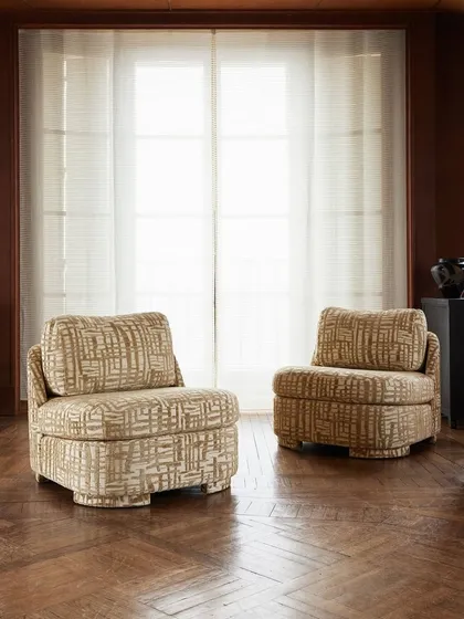 The Montana slipper chair from Nobilis, shown here in a bold, graphic-patterned upholstery, introduces fluid curves and effortless elegance. This piece adds a touch of graceful charm and modern artistry to any space.