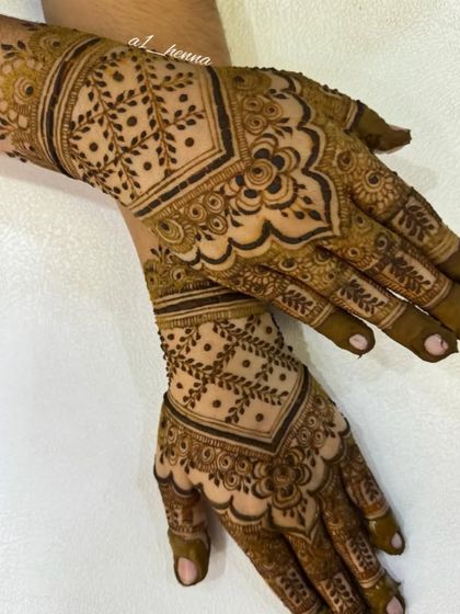 A modern geometric design with leafy fillers.