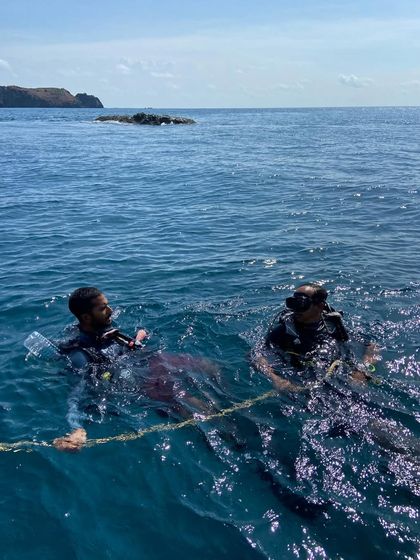 Moments from our Andaman dive trips, showing everything from gearing up at the dive center to relaxing on the boat between dives.