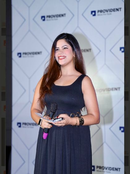 A happy, confident smile while hosting for Provident. My positive energy is infectious and helps create a welcoming atmosphere for guests.