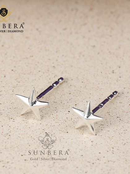 Simple yet classic silver star stud earrings. These offer an understated elegance and a touch of celestial magic for everyday wear.