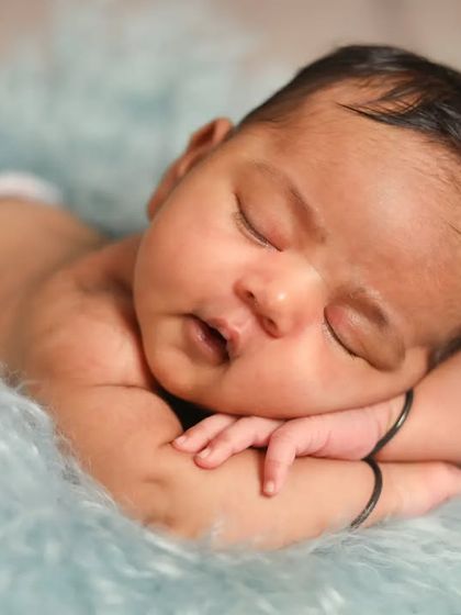 Look at this handsome little guy, sleeping so peacefully. The chin-on-hands pose is a classic for a reason, it's just too cute.