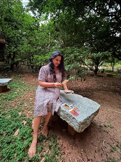 A wider shot from my World Tarot Day photoshoot. The combination of the stone bench, the lush greenery, and the cards laid out feels so grounding and connected to the earth.