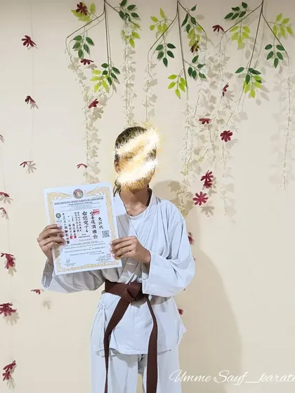 A proud moment for this student, earning her brown belt. Her dedication during training really showed during the belt exam.