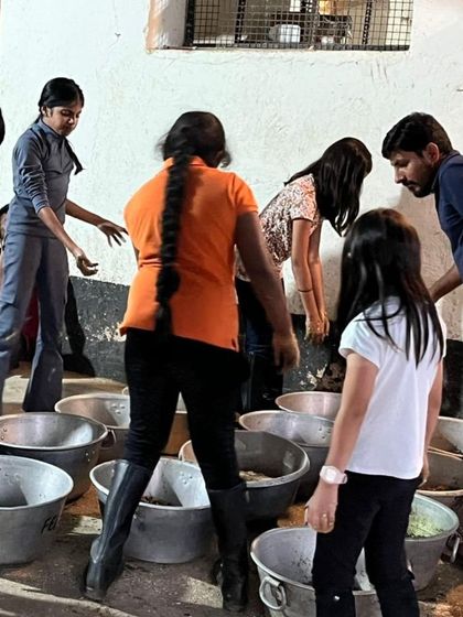 Kids at my summer camp learn about horse nutrition by helping to prepare their evening feeds. This hands-on experience is part of my holistic approach to horsemanship.