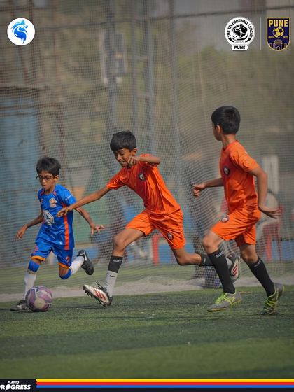 A burst of speed as players chase down the ball. This photo captures the dynamic and fast-paced nature of our Pune matches.