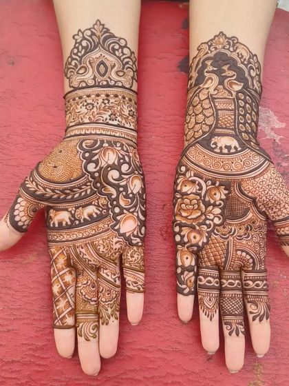 A beautiful design with elephants and peacocks.