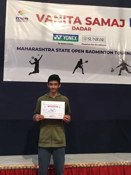 Pravit proudly holding his certificate at the state open tournament. This achievement reflects his high level of skill and dedication.