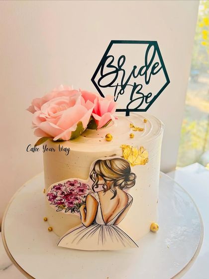 A pretty and elegant cake for a bride-to-be, with a delicate floral touch.