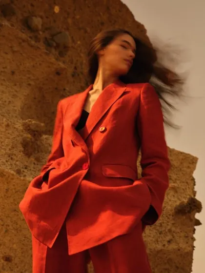 I believe in power dressing that feels both fluid and commanding. This crimson red linen suit, styled for an editorial, makes a statement of strength and sensuality, proving that confidence is the ultimate accessory.