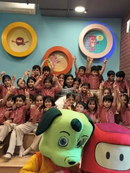 Another great group photo with the Somerville International School students and our mascots, showcasing the fun and welcoming atmosphere we create.