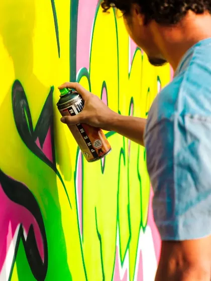 A close-up of me working on the live graffiti piece at NH7. You have to be fast and confident when you're painting on stage.