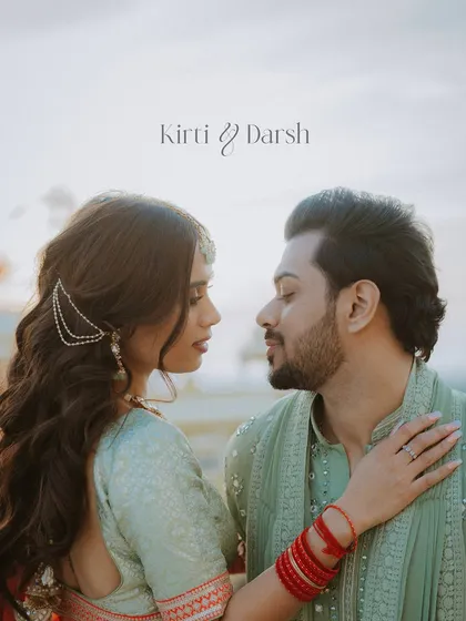 A close-up, artistic portrait of the couple, capturing an intimate gaze between them.
