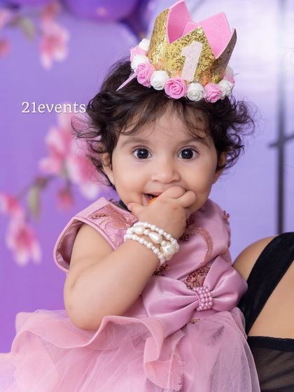 A close-up of the adorable birthday girl in her princess crown.