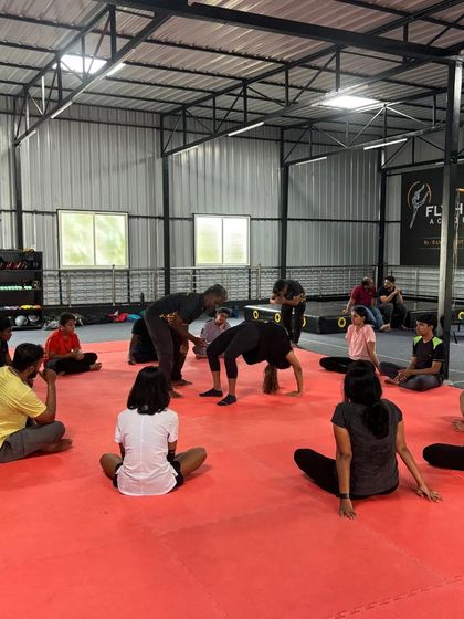 A wider view of our workshop, showing students learning and practicing together in a group setting.