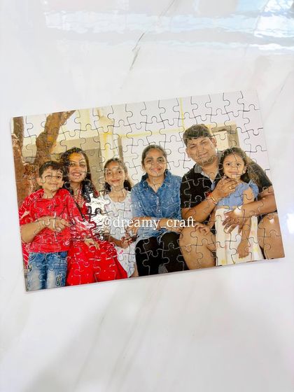 A custom A4 photo puzzle featuring a happy family portrait, a wonderful keepsake for the whole family to enjoy.