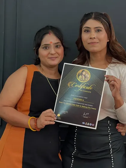 Sandhya, holding her certificate of completion. It’s a joy to see women empowering themselves through this art form.
