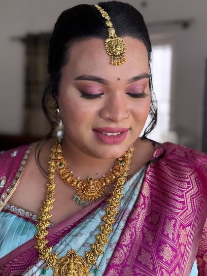 A detailed close-up of the eye makeup and skin finish for Preethi's baby shower. I teach how to create a smooth base that looks like second skin, even in close-up shots.