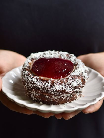 Our Lamington Croissant Cup, a weekend special that combines Australian inspiration with our baking style. The dark chocolate, coconut, and berry flavours are a perfect match for the rich croissant.