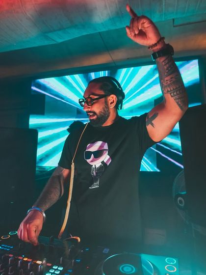 Hyping up the crowd at a club in Kolkata. My performance style is interactive and energetic, ensuring everyone feels like part of the show.
