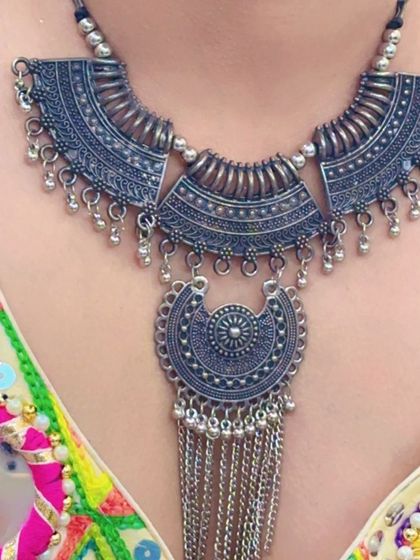 A detailed shot of the statement oxidized necklace, showing the craftsmanship.