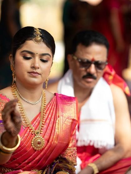 A candid moment during the wedding rituals. My makeup is designed to be long-wearing and resilient, ensuring the bride looks fresh and flawless throughout the entire ceremony.