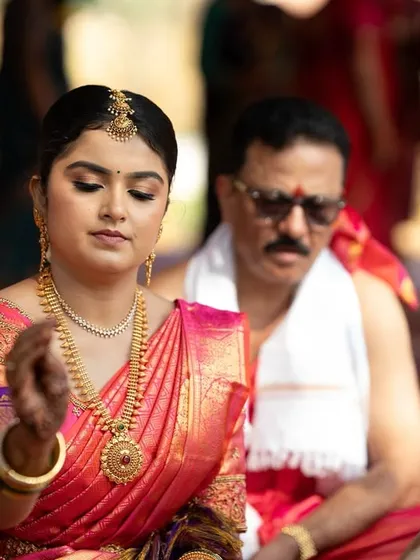 A candid moment during the wedding rituals. My makeup is designed to be long-wearing and resilient, ensuring the bride looks fresh and flawless throughout the entire ceremony.