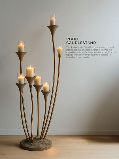 The Rooh Candle Stand is designed to do more than just hold a candle; it frames the light itself. Handcrafted with a sturdy natural stone base and fluted stone holders, it resembles a blooming bud and turns illumination into an art form.
