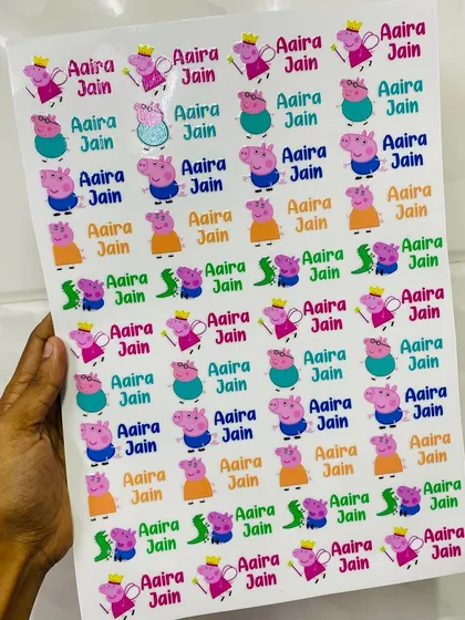 Say goodbye to lost items with these fun and durable name stickers. This sheet, customized with a Peppa Pig theme for Aaira, is perfect for labeling tiffin boxes, water bottles, and school books.