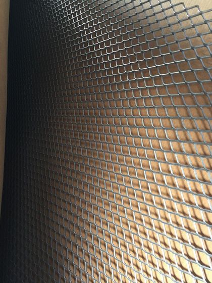 A close-up of the new, heavy-duty expanded metal screen we hoped would be more durable than the last one.