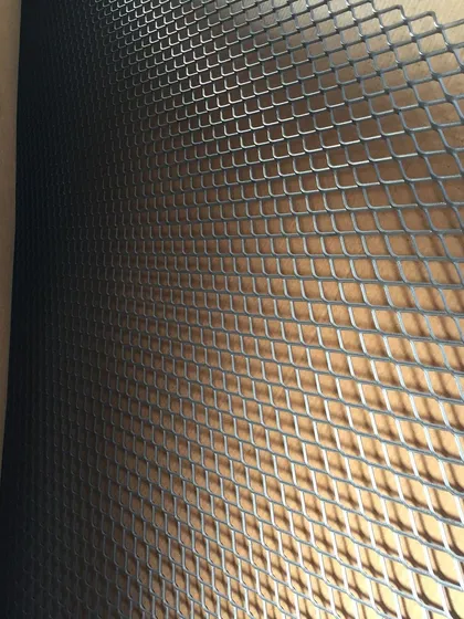 A close-up of the new, heavy-duty expanded metal screen we hoped would be more durable than the last one.
