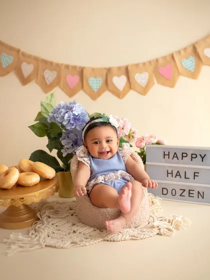 Another sweet shot from the "Happy Half Dozen" session. These sitter sessions are perfect for when babies can sit up and show off their adorable personalities.