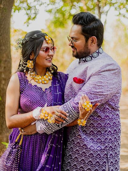 A romantic portrait of the couple during their Haldi ceremony. Their coordinated outfits and loving gaze make for a beautiful photograph.