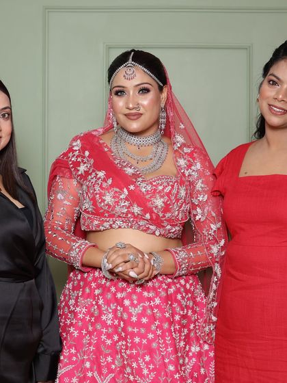 A student and her model on portfolio day. It's a proud moment for both me and my student to see their final work.