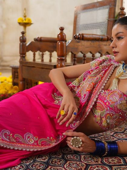 This cluster is a tribute to the saree in all its forms. It includes traditional weaves, modern pre-draped styles, and sarees paired with unique blouses, showcasing the endless possibilities for styling this iconic Indian garment.