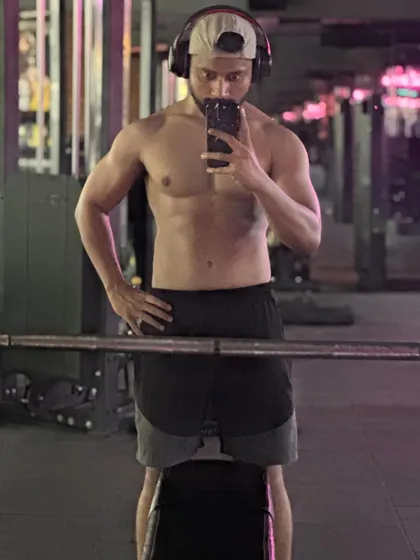 Another angle showcasing the hard-earned physique after months of dedication. Our programs are designed to help you achieve the look you've been working for.