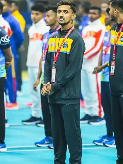 Aniket Pote of the Mumbai Khiladis, a picture of focus before a match.