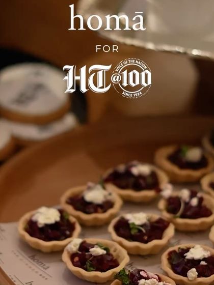 Beetroot and feta tartlets, another of our creative canapés, branded for the HT100 event. We seamlessly integrate client branding into our culinary presentation.