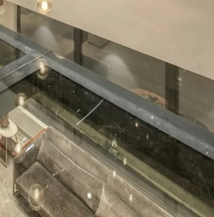 Another perspective through the glass floor, demonstrating the feeling of transparency and vertical space we aimed to create.