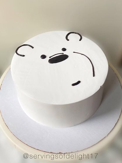 A minimalist "We Bare Bears" cake featuring Ice Bear. This clean and simple design is perfect for fans of the show.