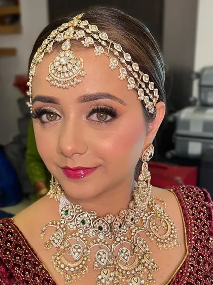 A stunning portrait showing off her flawless base and sparkling eyes. This look is perfect for the bride who wants to feel like royalty.