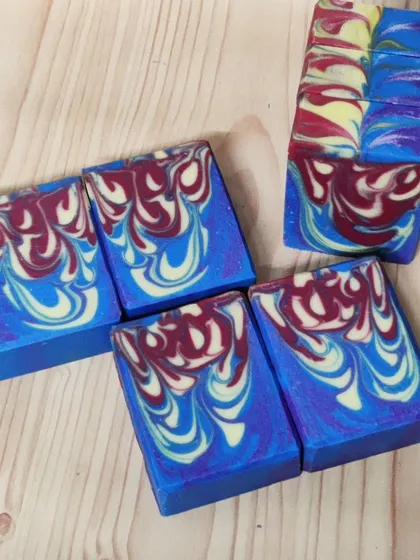 A different angle of my drop swirl soaps, showing the intricate patterns that form on the sides of the bars as well as the top.