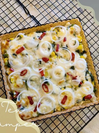 A collage showcasing the items in our Tea Hamper. It includes our popular Corn Spinach Quiche, flaky Cheese Straws, and a loaf of Sun-dried Tomato Focaccia bread.