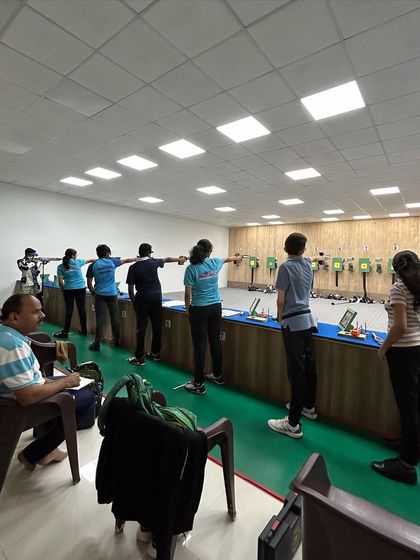 A wide view of our ISSF Air Pistol shooters during a final match practice, simulating competition conditions to build pressure-handling skills.