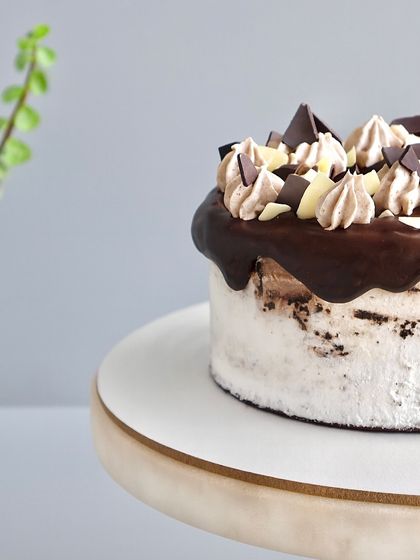 Another angle of this indulgent creation. The combination of rich chocolate, whipped cream, and a touch of Irish magic makes this cake a truly special treat.