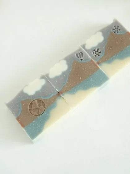 A lineup of 'Mountain Mist' bars, creating a continuous landscape.