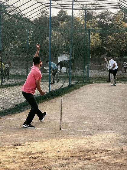 A bowler in action during our practice session. We take our preparation seriously.