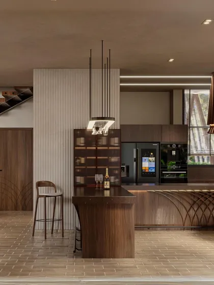 This render shows the kitchen and bar area of the Siori Lilly Villas. The design uses a rich walnut wood and a curved bar with intricate detailing, creating a sophisticated space for entertaining.
