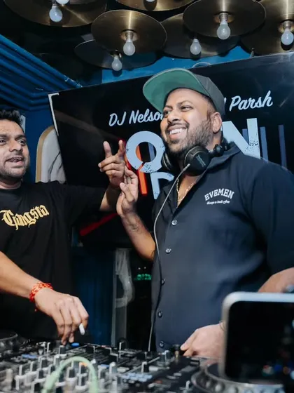 Sharing a laugh behind the decks during a back to back session. I love collaborating with other artists; it keeps the energy fresh and the party unpredictable.