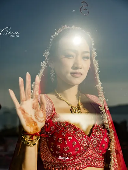 We wanted more than a beautiful bridal portrait. We wanted meaning. Inspired by the Crown Chakra, we waited for the sun to align, creating a glowing bindi in a moment that felt less like a photograph and more like a cosmic nod.